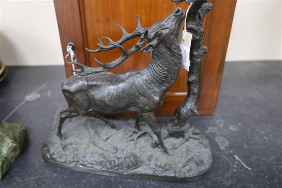 Pierre Jules Mene. A bronzed model of a stag beside a tree trunk, height 15in.